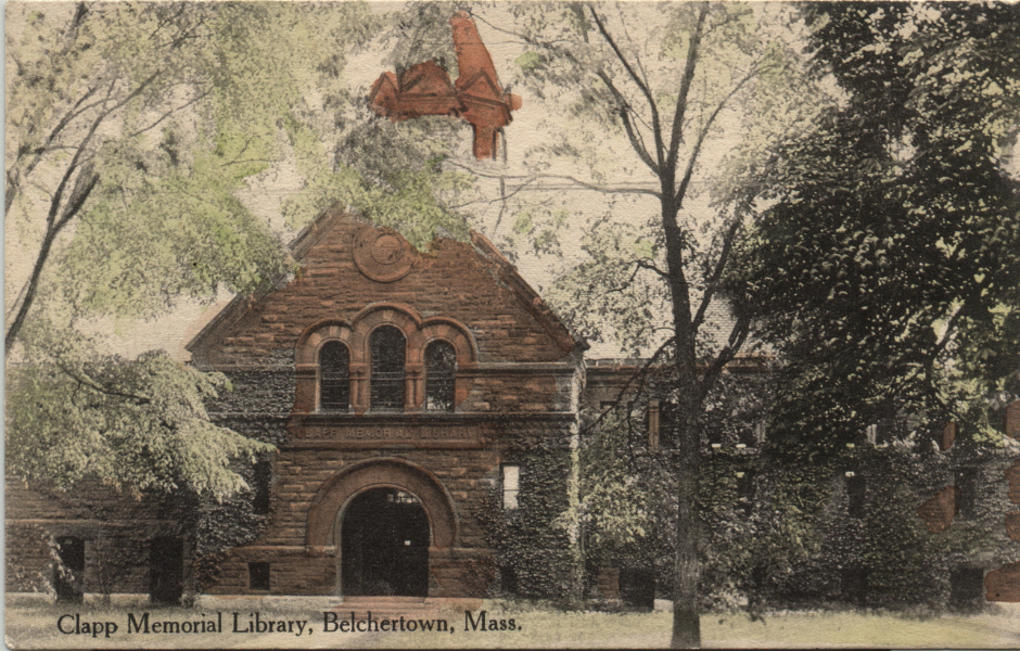 historic color photo of the outside of the building with dogwood trees in bloom in front