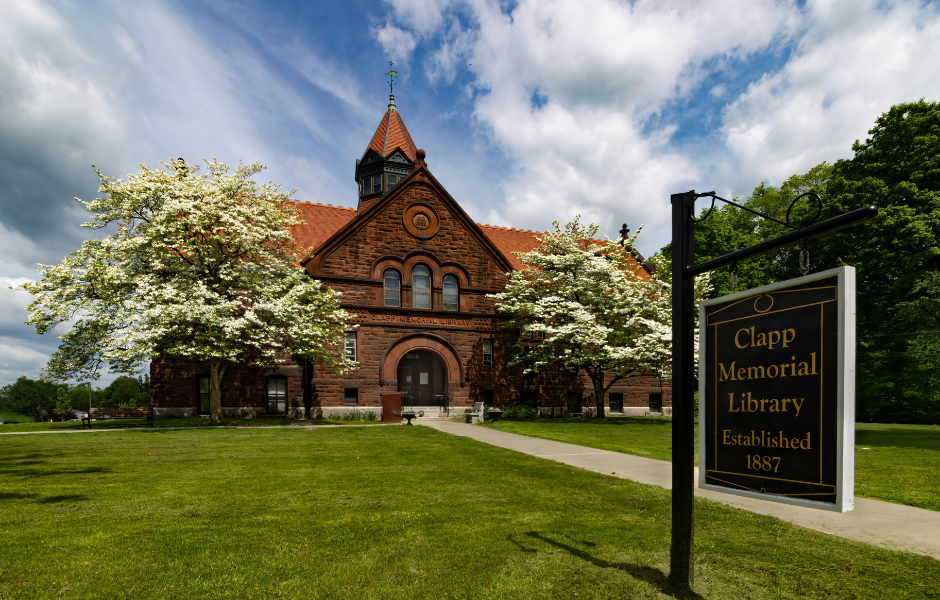 clapp memorial library framed by flowering dogwoods